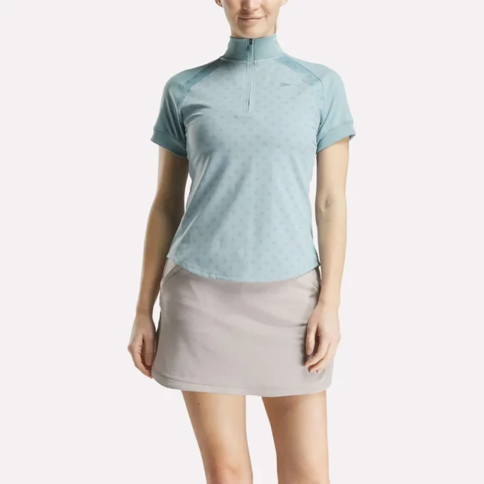 Kortærmet 1/4 lynlås mini-top med argyle-print til kvinder Kortærmet 1/4 lynlås mini-top med argyle-print til kvinder