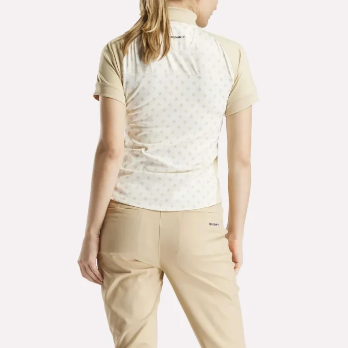 Kortærmet 1/4 lynlås mini-top med argyle-print til kvinder Kortærmet 1/4 lynlås mini-top med argyle-print til kvinder