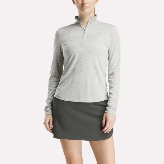 Langærmet Engineered Vector Jacquard 1/4 Zip golfpullover til kvinder Langærmet Engineered Vector Jacquard 1/4 Zip golfpullover til kvinder