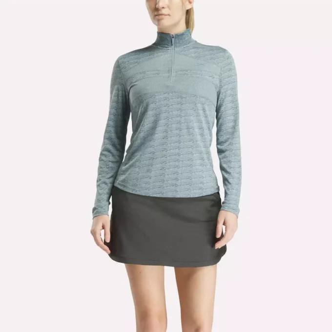 Langærmet Engineered Vector Jacquard 1/4 Zip golfpullover til kvinder Langærmet Engineered Vector Jacquard 1/4 Zip golfpullover til kvinder