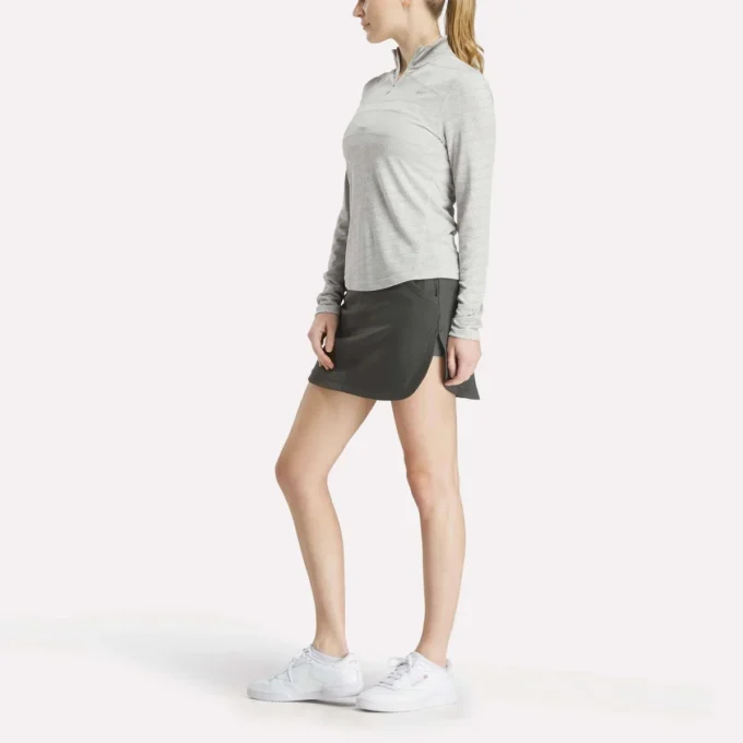 Langærmet Engineered Vector Jacquard 1/4 Zip golfpullover til kvinder Langærmet Engineered Vector Jacquard 1/4 Zip golfpullover til kvinder