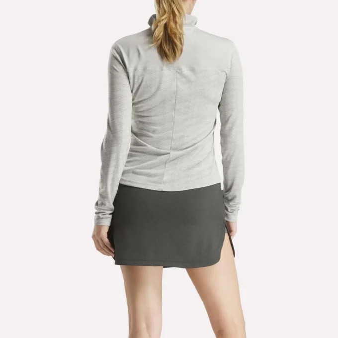 Langærmet Engineered Vector Jacquard 1/4 Zip golfpullover til kvinder Langærmet Engineered Vector Jacquard 1/4 Zip golfpullover til kvinder