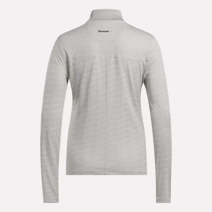 Langærmet Engineered Vector Jacquard 1/4 Zip golfpullover til kvinder Langærmet Engineered Vector Jacquard 1/4 Zip golfpullover til kvinder